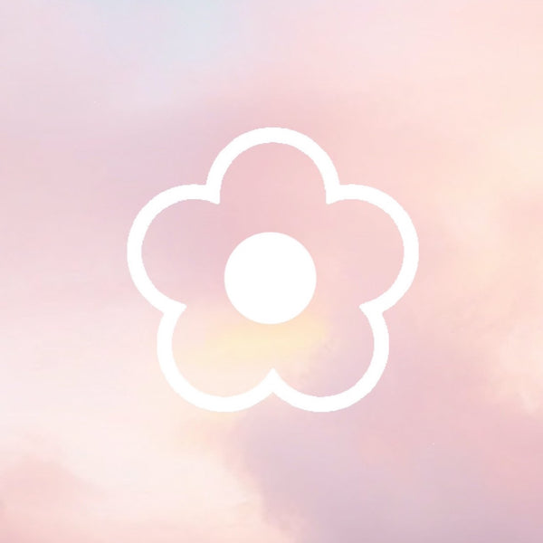 faded pink sunset background with a white overlay example of a 90s style flower decal. the decal is the outline and the middle only.