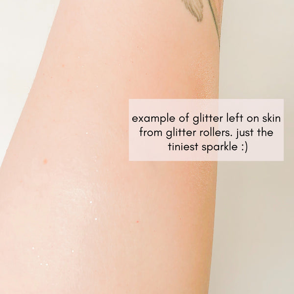 white woman's arm with very subtle glitter on it, showing how the glitter from the bottle appears on the skin 